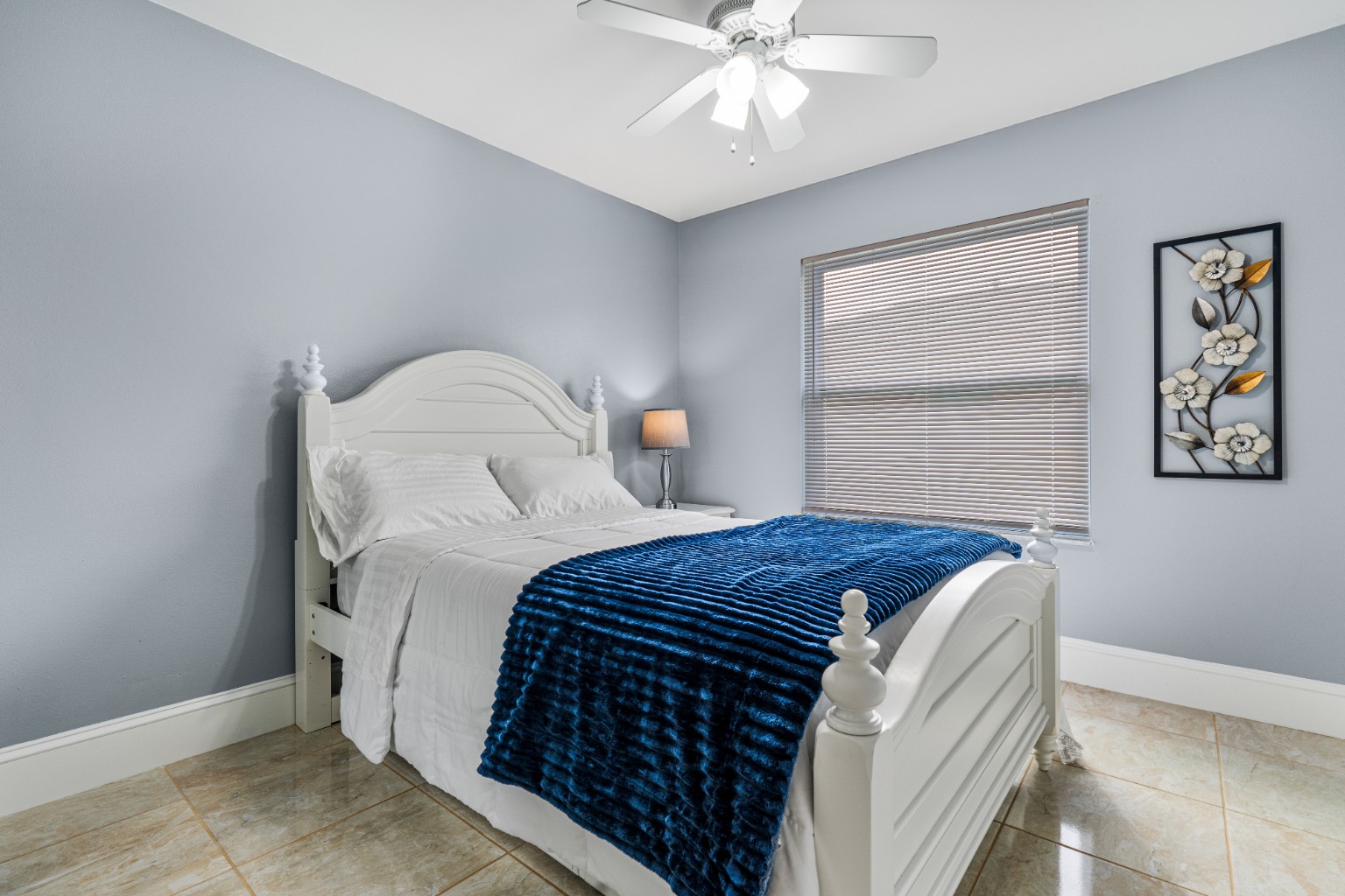 Bedroom with blue blanket